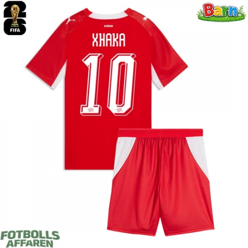 Schweiz Granit Xhaka #10 Hemmaställ Barn VM 2026 Kortärmad (+ Korta byxor)